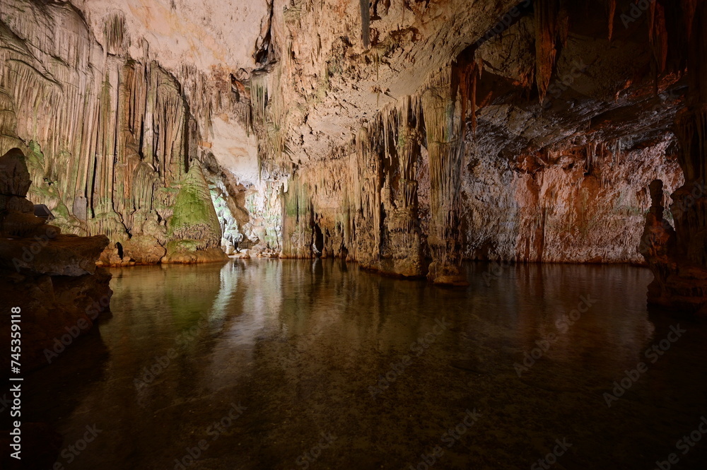 Neptune's Grotto, a stalactite cave near the town of Alghero on the island of Sardinia, Italy, also known as Grotta di Nettuno Neptune's Grotto, a stalactite cave near the town of Alghero on the island of Sardinia, Italy, also known as Grotta di Nettuno