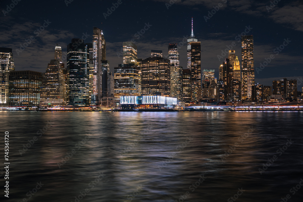 New York skyline with east river at night