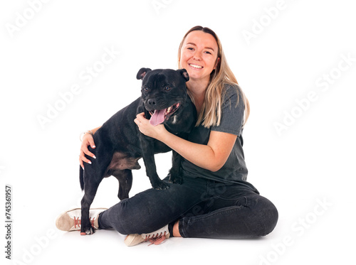 staffordshire bull terrier and woman