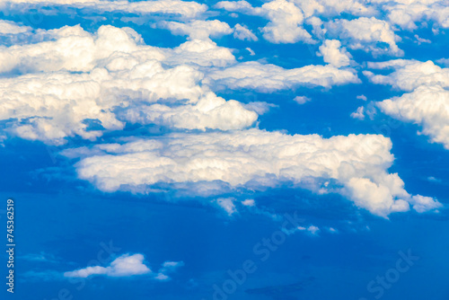 Flying in an airplane somewhere over the landscape of Costa Rica.