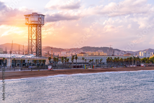 View over the famous Barceloneta beach during sunset in Barcelona, Spain. photo