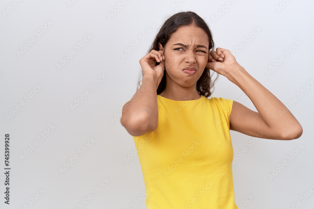 Young african american woman doing noisy gesture over isolated white background Young african american woman doing noisy gesture over isolated white background