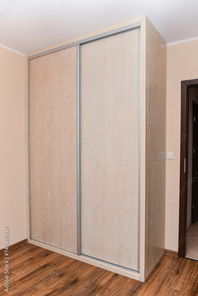 Fototapeta premium Wardrobe n the interior of the bedroom