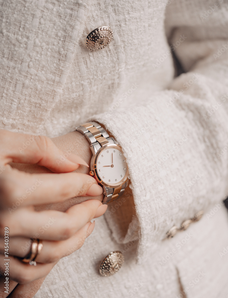 Beautiful elegant stylish watch on woman hand. Close-up photo.