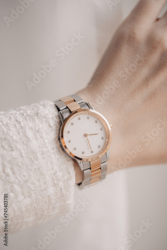 Beautiful elegant watch on woman hand. Close-up photo.