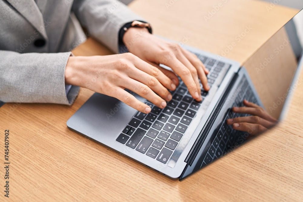 Young caucasian woman using laptop at office Young caucasian woman using laptop at office