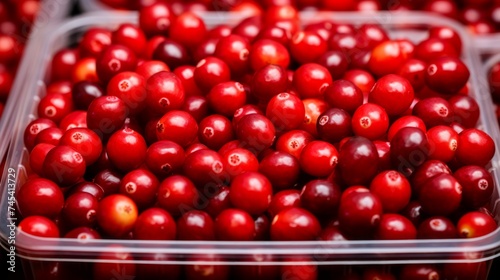 A box packed with vibrant red cranberries  close-up realistic photo Generative AI