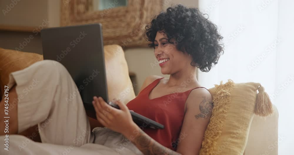Laugh, laptop and woman on sofa in home for online streaming, social networking and communication. Relax, happy and person typing on computer for internet, website and watching videos in living room