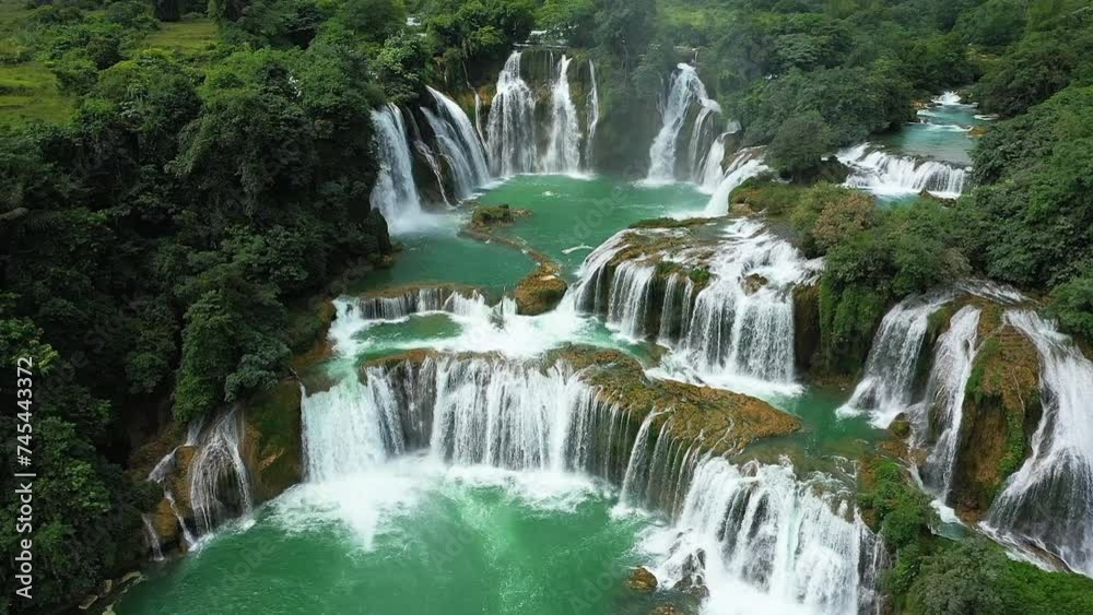 Ban Gioc waterfall in green mountains , Asia, northern Vietnam, Cao Bang, towards Lang Son, in summer on a sunny day.