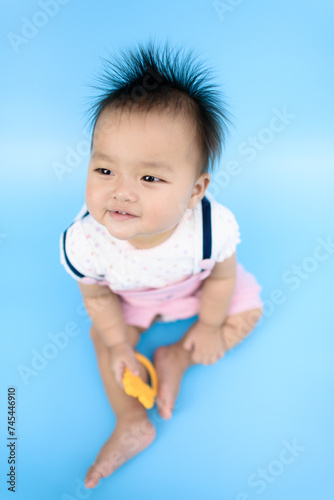 Asian Baby on blue background