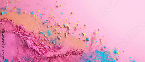 Holi festival wallpaper with colorful powder on a pink background, wide banner with copy space © angelo sarnacchiaro
