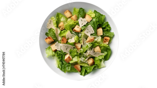 Caesar salad with chicken, wheat croutons and Parmesan in a plate isolated on transparent background, top view.  Healthy diet food.