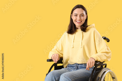 Happy young woman in wheelc...