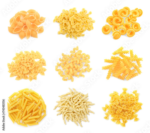Different types of pasta isolated on white, top view