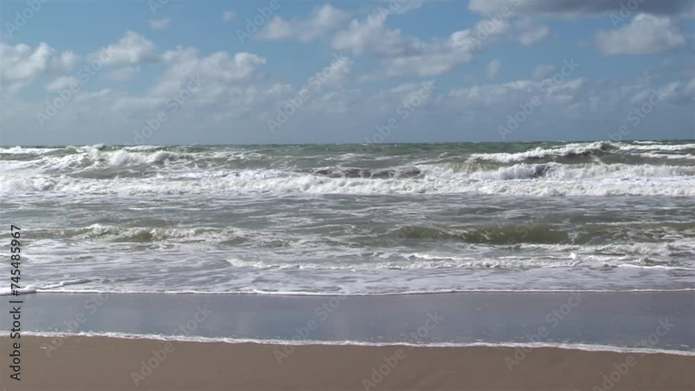 Waves Crashing On Sandy Beach in Pinamar, Buenos Aires Province, Argentina. Waves Crashing On Sandy Beach in Pinamar, Buenos Aires Province, Argentina.