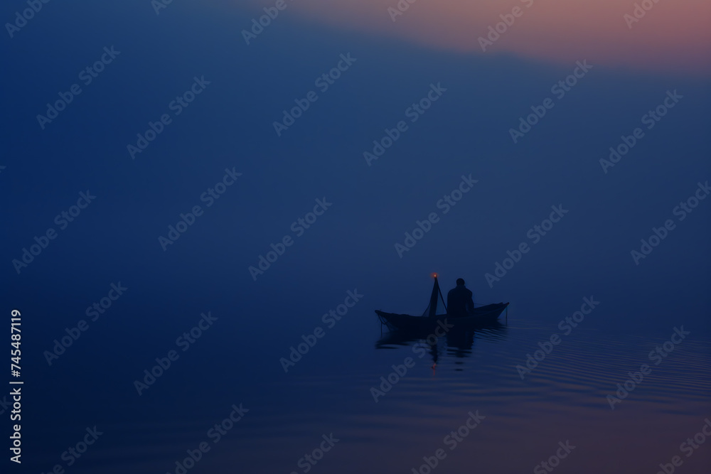 Solitary Boatman on a Misty Lake at Twilight Solitary Boatman on a Misty Lake at Twilight