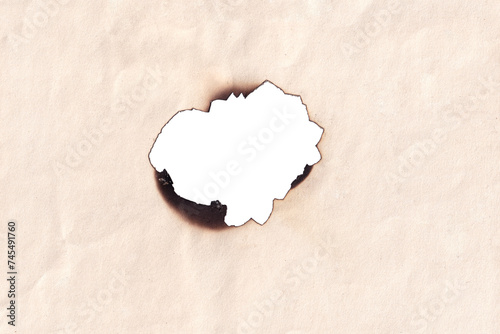 hole in paper. Burnt piece of paper. burnt paper texture. piece torn burned edge. old piece of paper with burned edges. piece of burnt paper isolated.
old paper with burnt edges