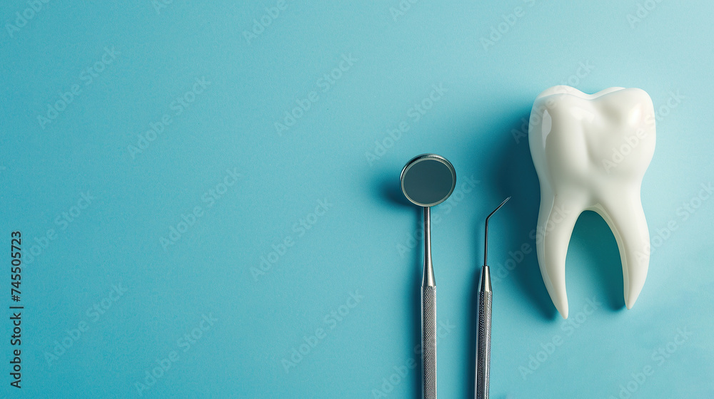 Tooth and dental tools on pastel blue background, dentist treatment, dentist mirror, hook
