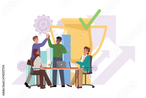Diverse Team Celebrates Great Success with High Fives. Two men giving high five as a sign of achievement and two diverse women sitting at the desk with laptops and joining the celebration.