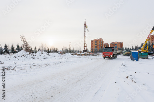 Canvas Print the construction site of an apartment building in the winter from a height