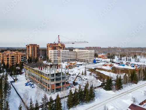 Canvas Print the construction site of an apartment building in the winter from a height