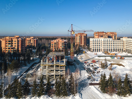 Photography the construction site of an apartment building in the winter from a height