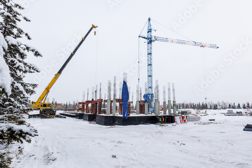 Photography the construction site of an apartment building in the winter from a height