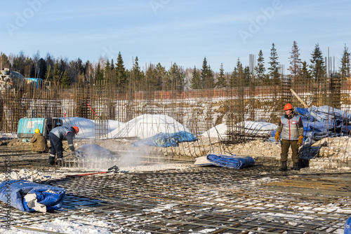 Photography the construction site of an apartment building in the winter from a height