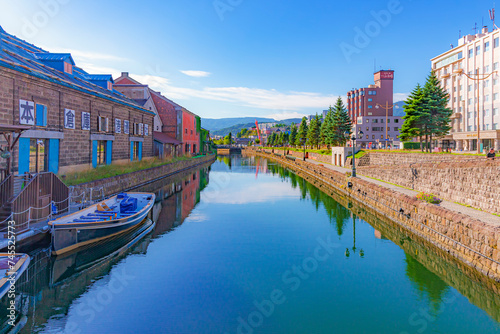Japan - September 3, 2023 : Scenic view of Otaru canal in summer blue sky day, Otaru canal is one of most famous tourist destination in Hokkaido photo