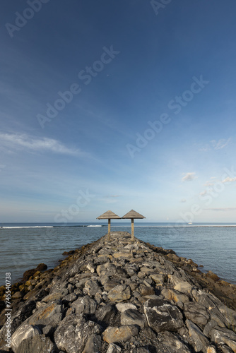Rocky embankment at the shore if Lhoknga beach in Aceh district, Indonesia photo