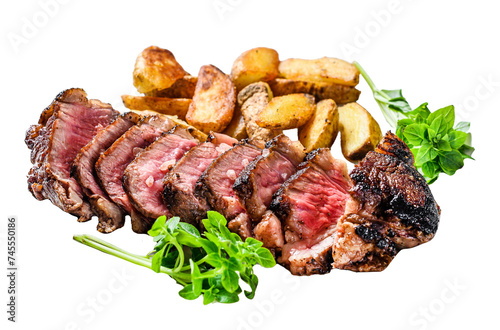 Sliced striploin steak with potato. Isolated on white background. Top view.