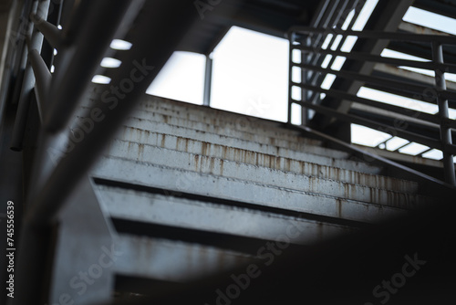 Metal overpass platform with banister structure of the factory place. Industrial building part. Close-up and selective focus. photo