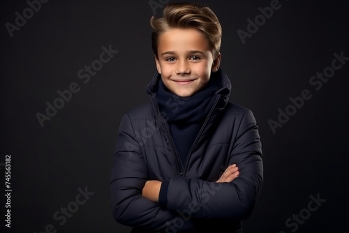 Portrait of a handsome young boy in winter clothes. Studio shot.