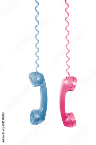 Vintage Telephone Handsets in Pink and Blue, A Nostalgic Communication Concept