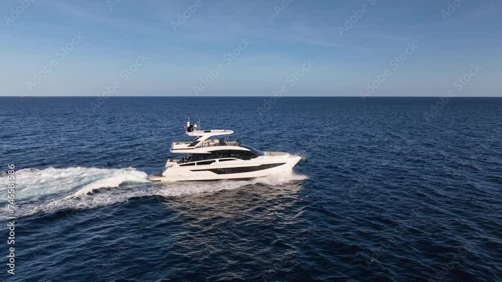 Luxury Yacht driving at Mediterranean Sea in Slow Motion Luxury Yacht driving at Mediterranean Sea in Slow Motion