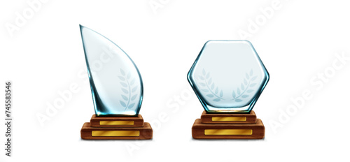 Glass trophy with laurel on wood stand with golden plate. Realistic vector set of transparent plexiglass crystal award on wooden base. Mockup of blank glossy acrylic winner prize cup on pedestal.