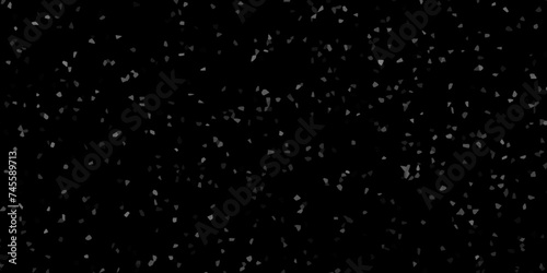 The dust sparks and golden stars shine with special light. Christmas background concept. Large flakes of snow slowly fall down.