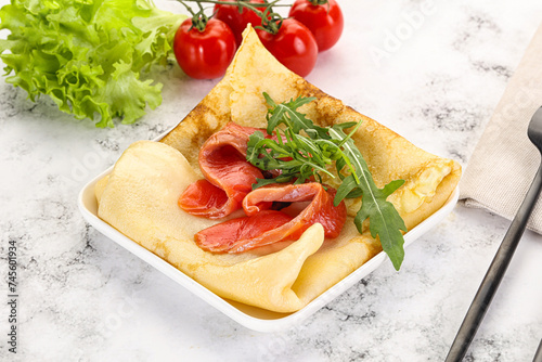 Russian pancake with salmon fish