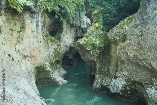 View of the canyon or gorge. Unique natural places. A large mountain river sandwiched between rocks. Natural landscape photo