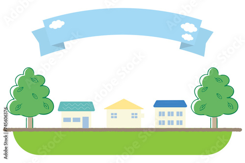 大きな緑の木に囲まれた家