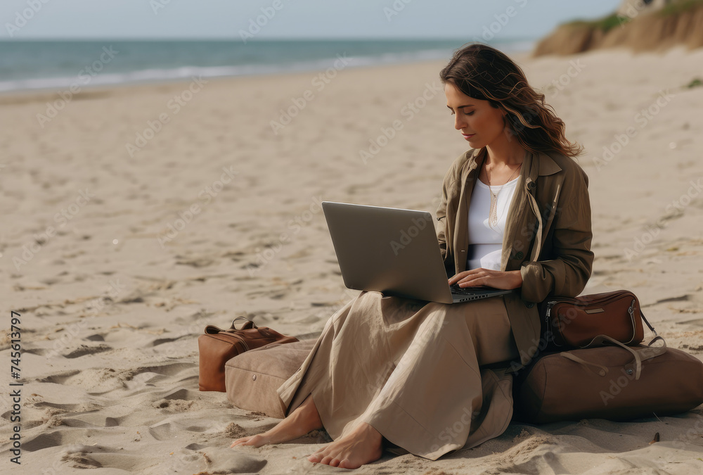 Young Woman Working Remotely on Sandy Beach
