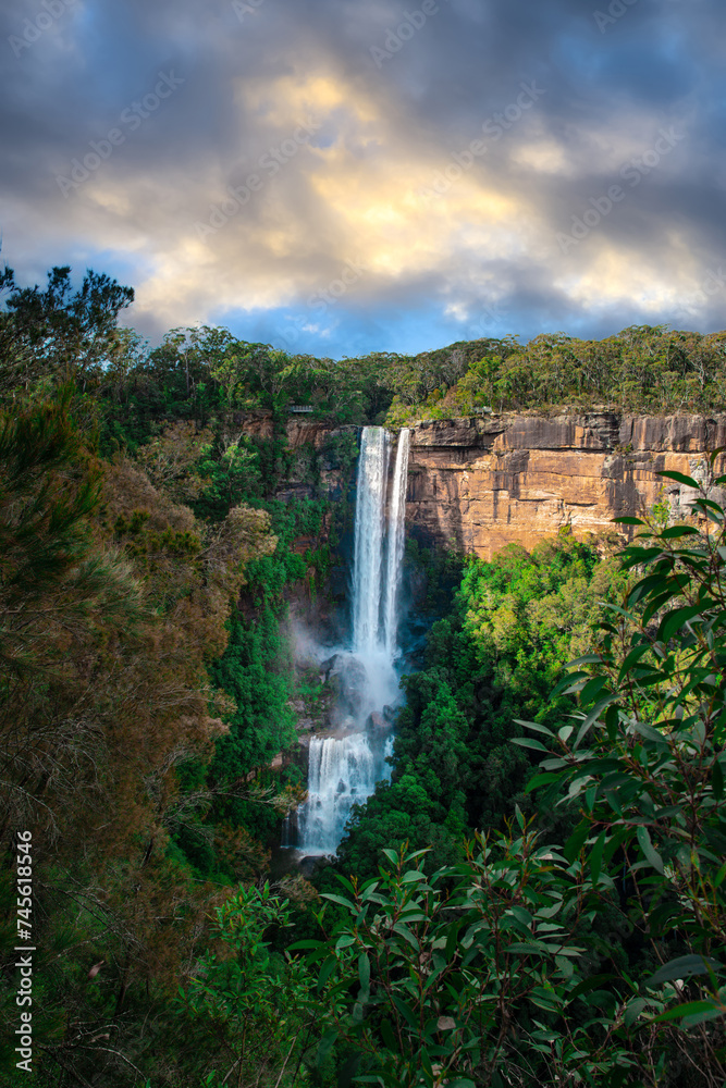 Beautiful flowing River in Fitzroy water Falls in Bowral NSW Australia beautiful colourful cloudy skies lovely waterfalls