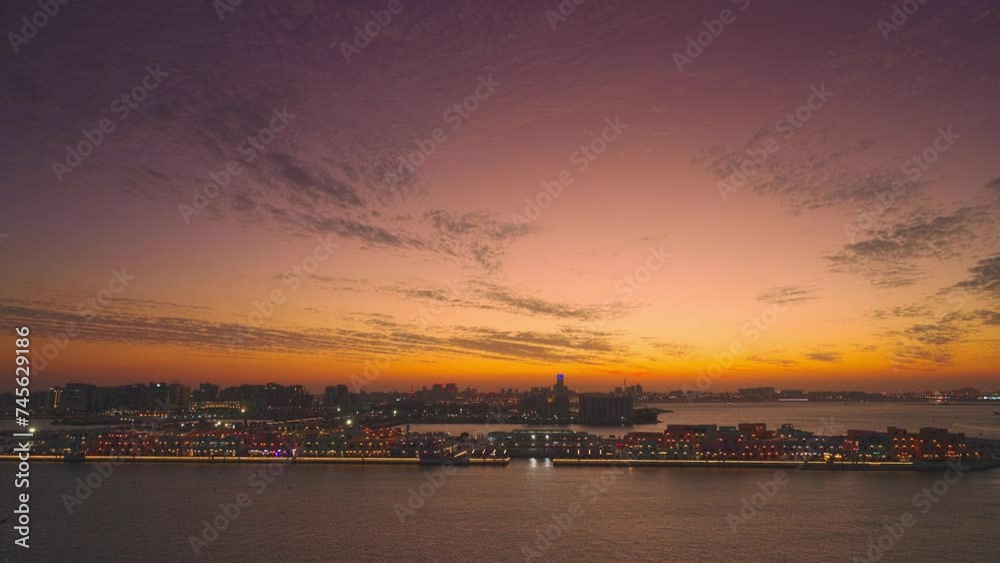 4k, Panorama of the skyscrapers of Doha at night with street lights and illumination, in the foreground the Mina district, part of the port of Doha, Doha, Qatar 4k, Panorama of the skyscrapers of Doha at night with street lights and illumination, in the foreground the Mina district, part of the port of Doha, Doha, Qatar