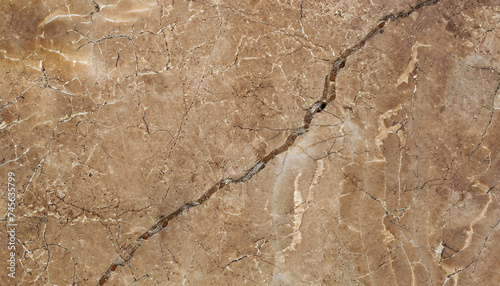 Brown marble wall texture with a crack; abstract textured background