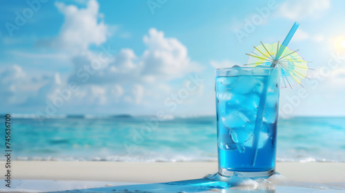 Blue Hawaii tropical cocktail drink with a beach and sea background. © sirins