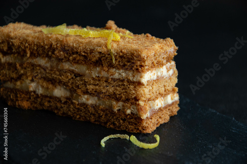 Cakes in a section on a dark background.