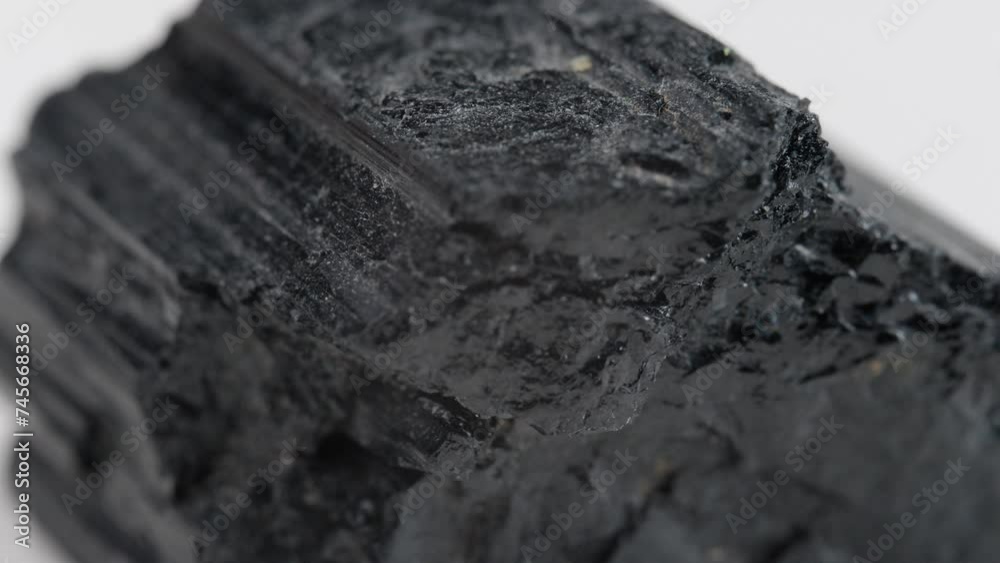 Macro Shot Of Abstract Charcoal Like Rock Spinning Around Showing Rough Texture On Surface Macro Shot Of Abstract Charcoal Like Rock Spinning Around Showing Rough Texture On Surface