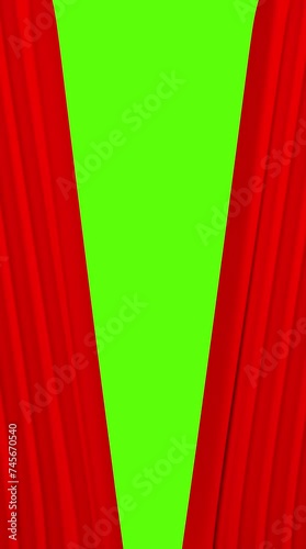 rideau de théâtre rouge qui s'ouvre, format vertical, fond vert photo