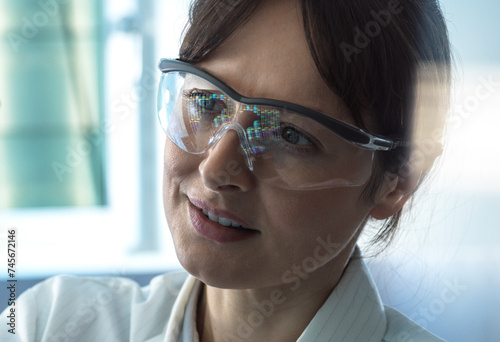 Scientist working on DNA sequencing data in laboratory
