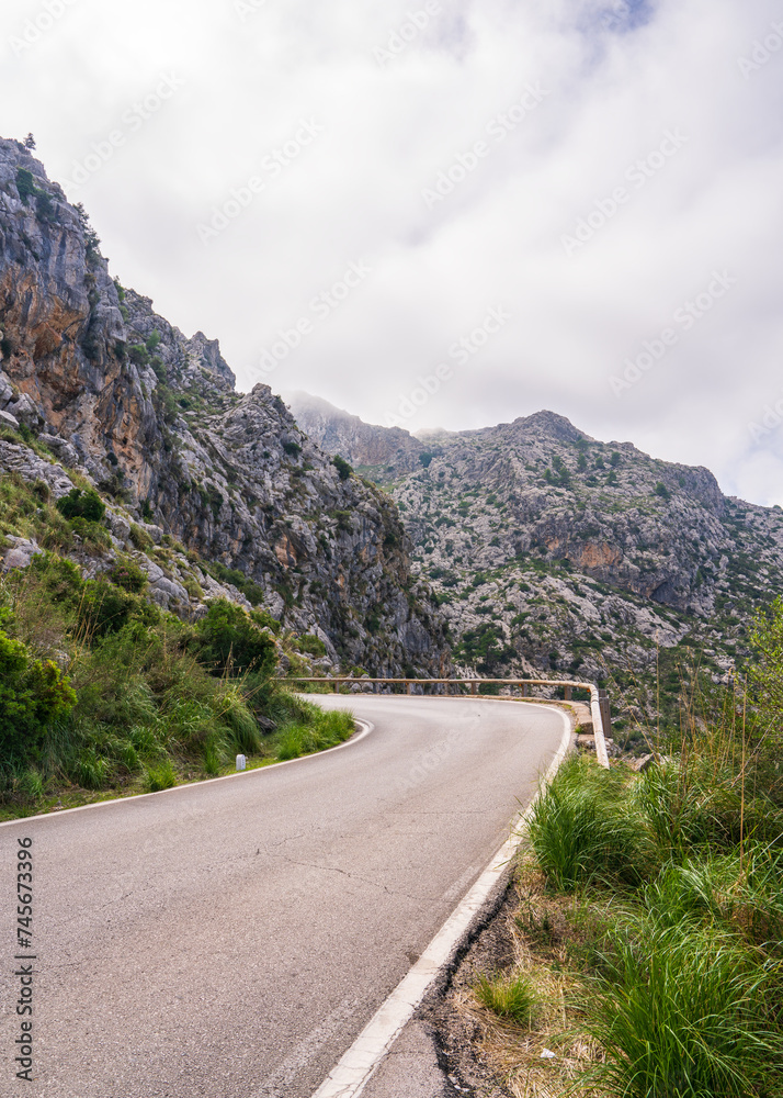 Clouds on the famous winding road in Sa Calobra on the island of Mallorca, Spain. Dangerous road turn in the clouds Travel around the island.